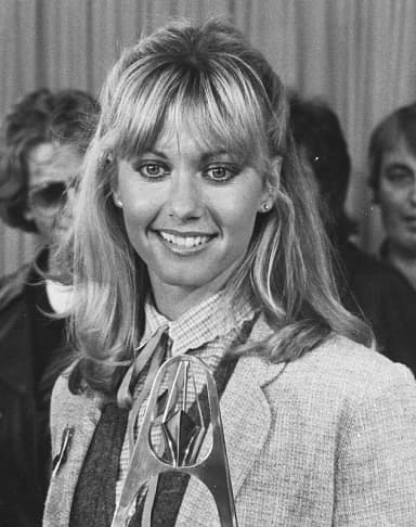 Olivia Newton-John: Collectie / Archief : Fotocollectie Anefo Reportage / Serie : [ onbekend ] Beschrijving : Aankomst zangeres Olivia Newton John op Schiphol; Olivia Newton John