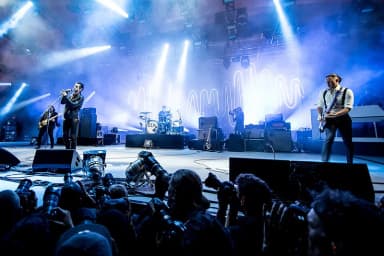 Arctic Monkeys: Arctic Monkeys performing on Orange Stage at Roskilde Festival 2014 in Denmark the 5th of July 2014. Photo by Bill Ebbesen.