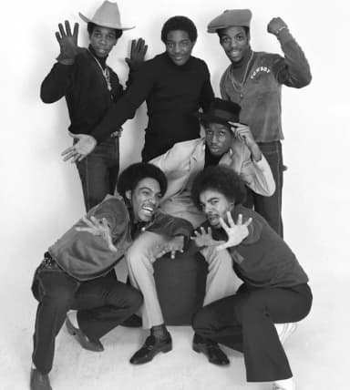 Grandmaster Flash and the Furious Five: Press Photo of the hip-hop group Grandmaster Flash and The Furious Five. Distributed c. 1982 by Sugarhill Records.
