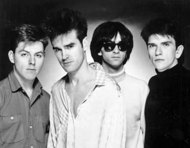 The Smiths: The Smiths in a promotional photograph for their debut album The Smiths, circa 1984. From left to right; Andy Rourke, Morrissey, Johnny Marr, and Mike Joyce.
